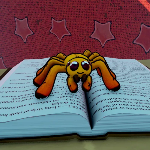 Webby, a plush spider sitting on an open dictionary